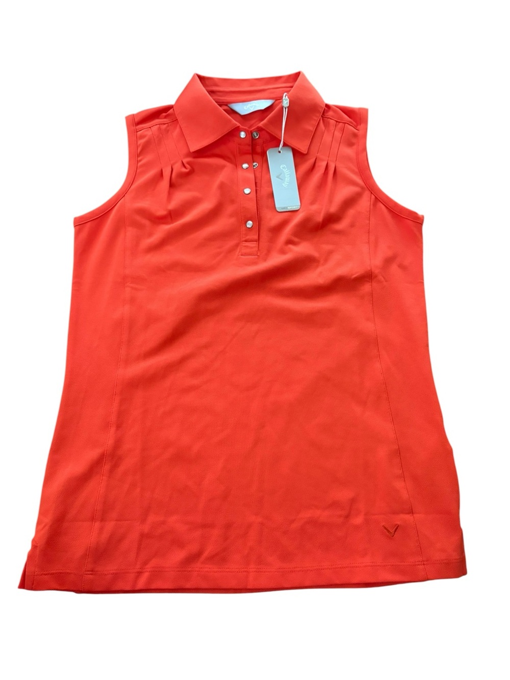 Callaway Women's Pintuck Sleeveless Snap Polo in a bright orange/coral color S